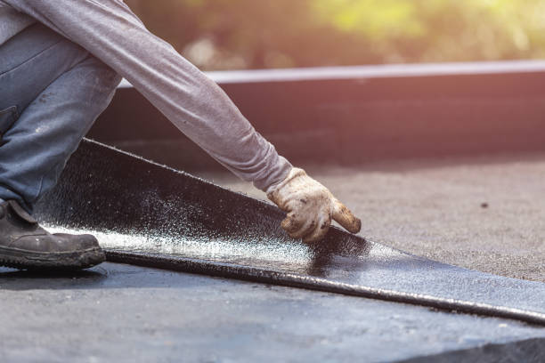 Professional Basement Waterproofing technician working in Martinsville, VA
